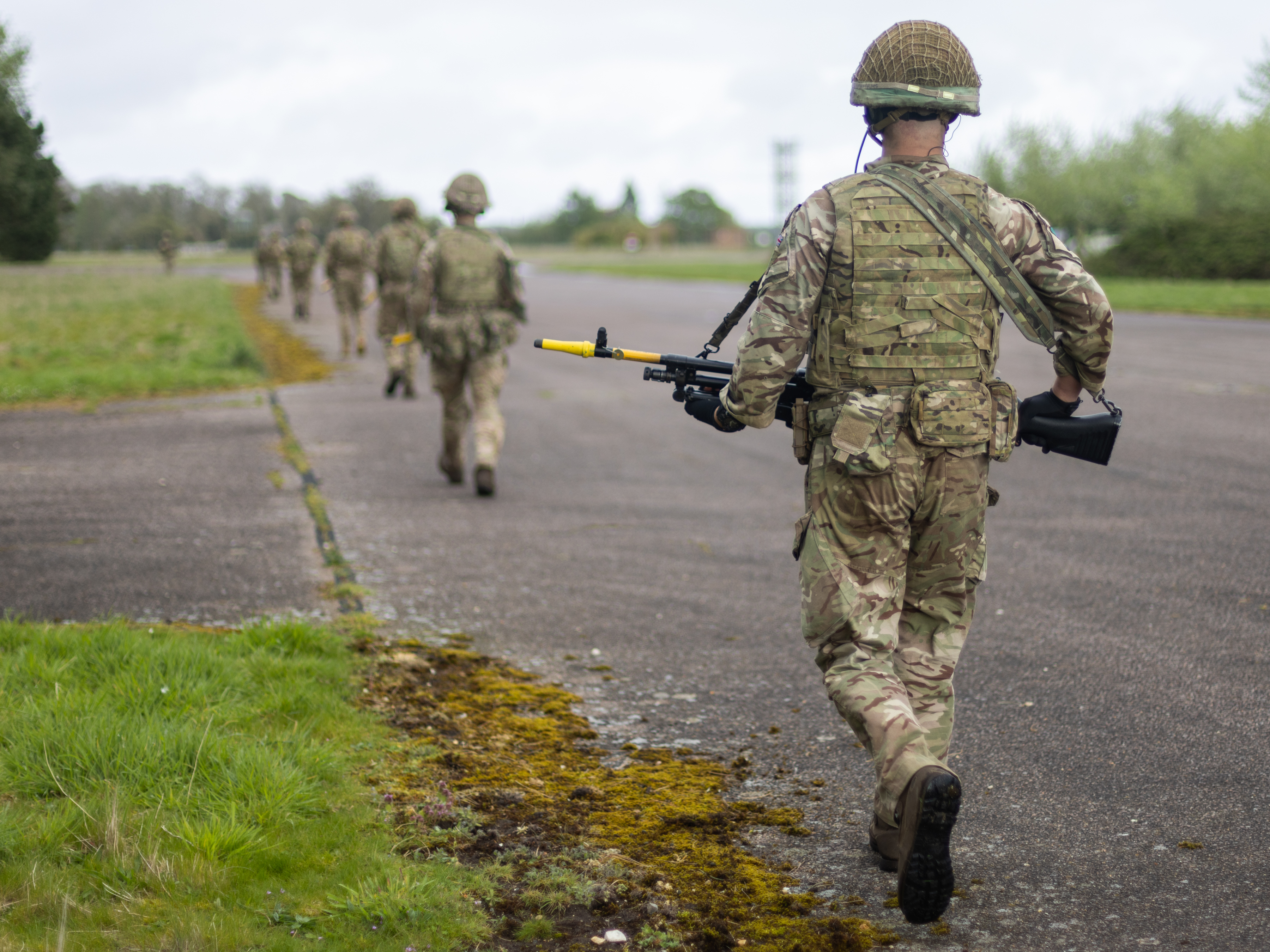 Photo: 1 Royal Irish Regiment patrol the 'CAGE' after disembarking the Atlas C Mk.1 aircraft.